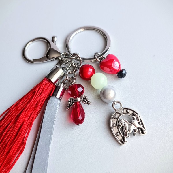 Piekariņš atstarotājs Zirgs sarkans 2026