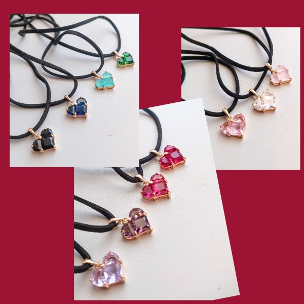 Melnās aukliņas rota ar sirsniņu