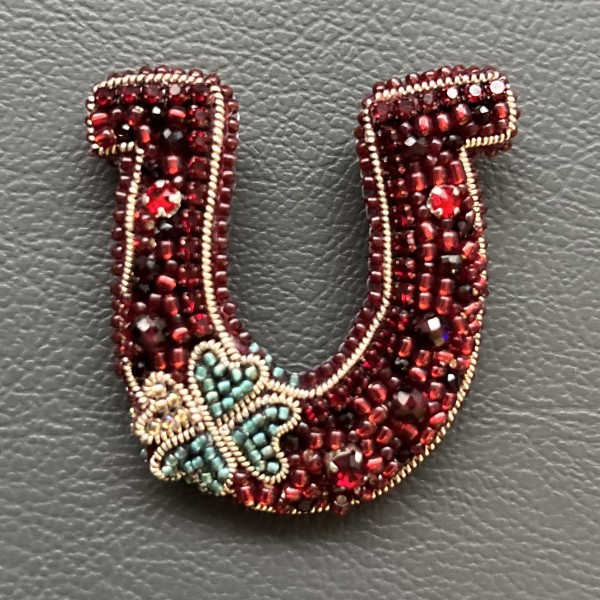 Piespraude “Pakavs ar veiksmes āboliņu”