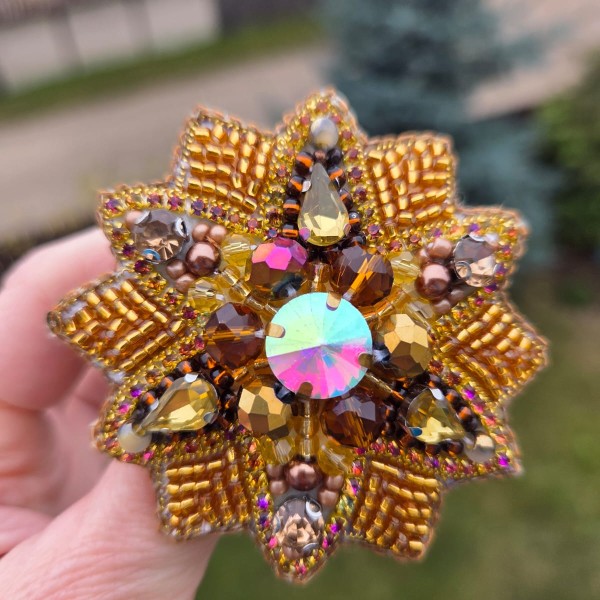 Piespraude Ziemas zelta puķe