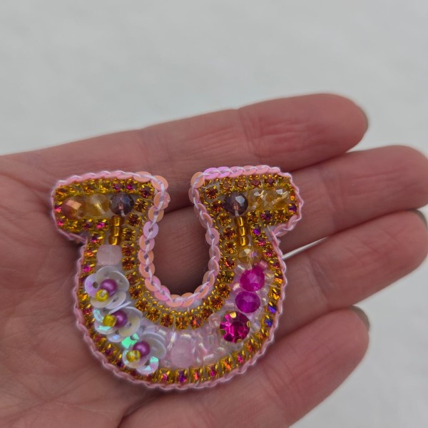 Piespraude Mazais ziedu laimes pakavs