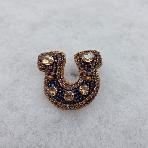 Piespraude Mazais zelta laimes pakavs