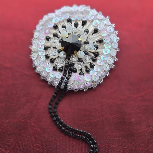 Piespraude Baltā pieneņpūka