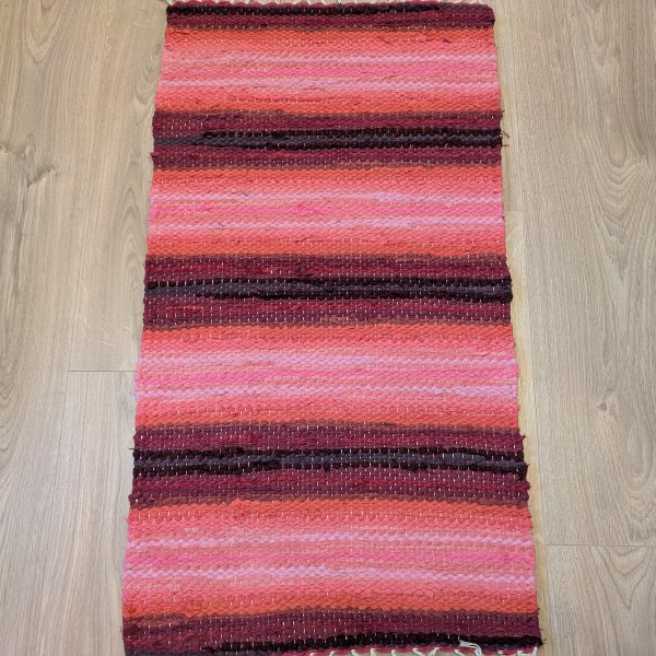 Mazs Austs paklājs aveņu, rozā, sārtos tonos, izmērs-47cm x 85 cm