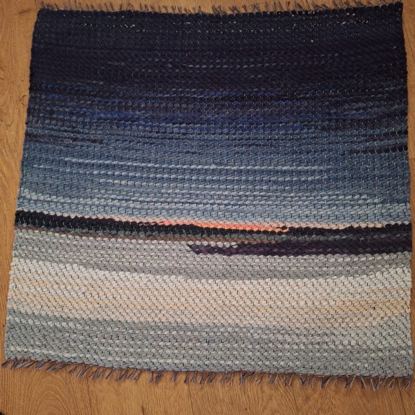 Mazs paklājiņš kā ainava