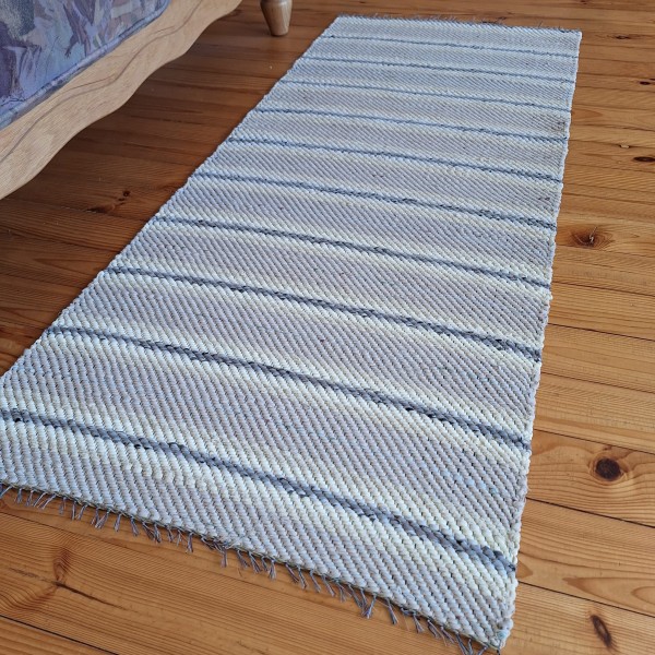 Paklājs balti bēšos toņos 1.44m