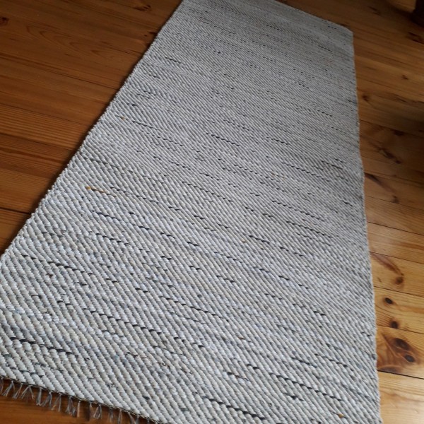 Balts paklājs
